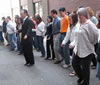 Michael Sweeney teaches audience how to dance the minuet.